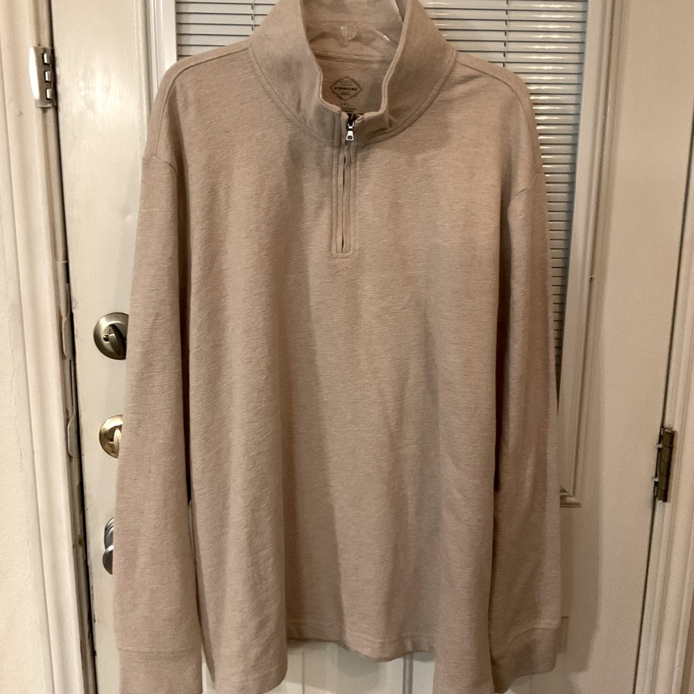 Excellent condition. Worn once. Long sleeve high collar sweater.
